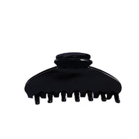 Large black acetate hair claw clip with strong spring and secure grip.