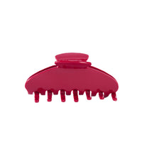 Large red acetate hair claw clip with durable construction and non-slip hold.