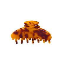 Large tortoise acetate hair claw clip with strong grip and rounded teeth