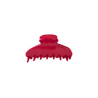 Medium red acetate hair claw clip with rounded teeth and firm grip.